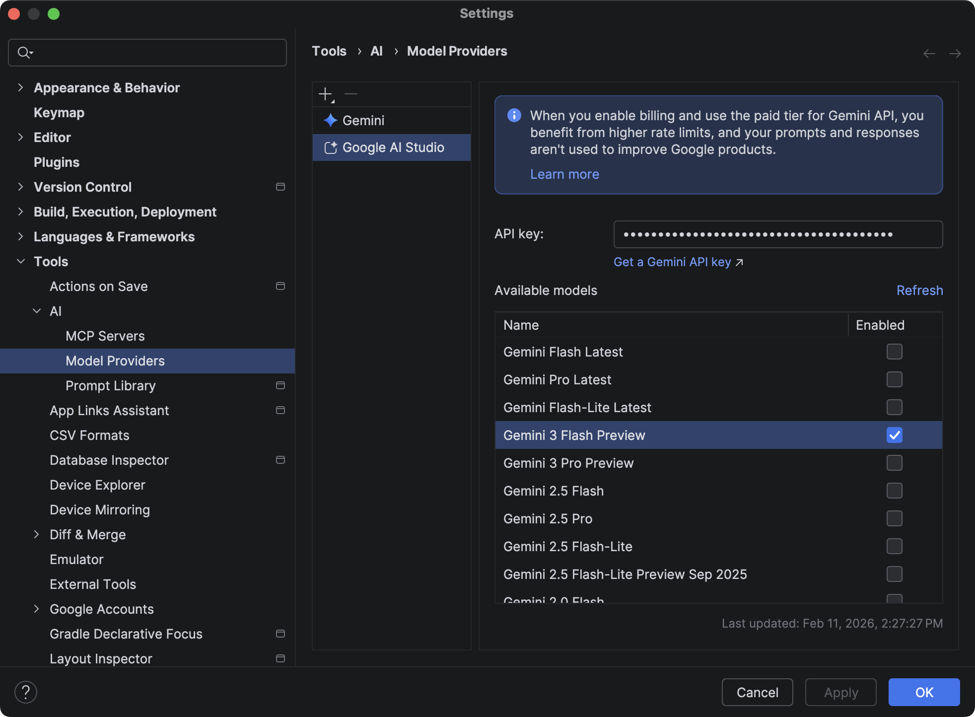 在 Android Studio 设置中添加 Google AI Studio API 密钥，具体位置为“Tools > AI > Model Providers”。